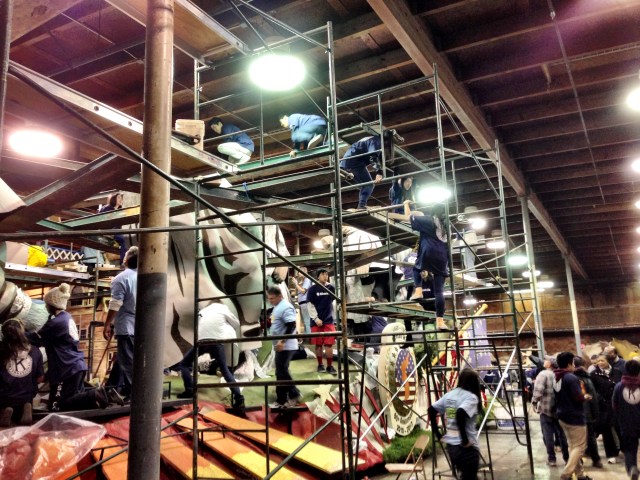 Kiwanis kids volunteering at the Rosemont Pavilion building Rose Parade Floats